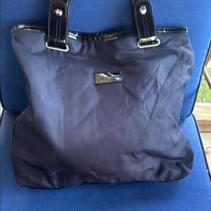 Calvin Klein Black Tote with Silver Accents and Spacious Design